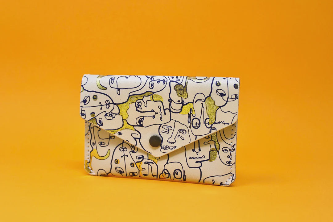 ARK Popper Purse Many Faces